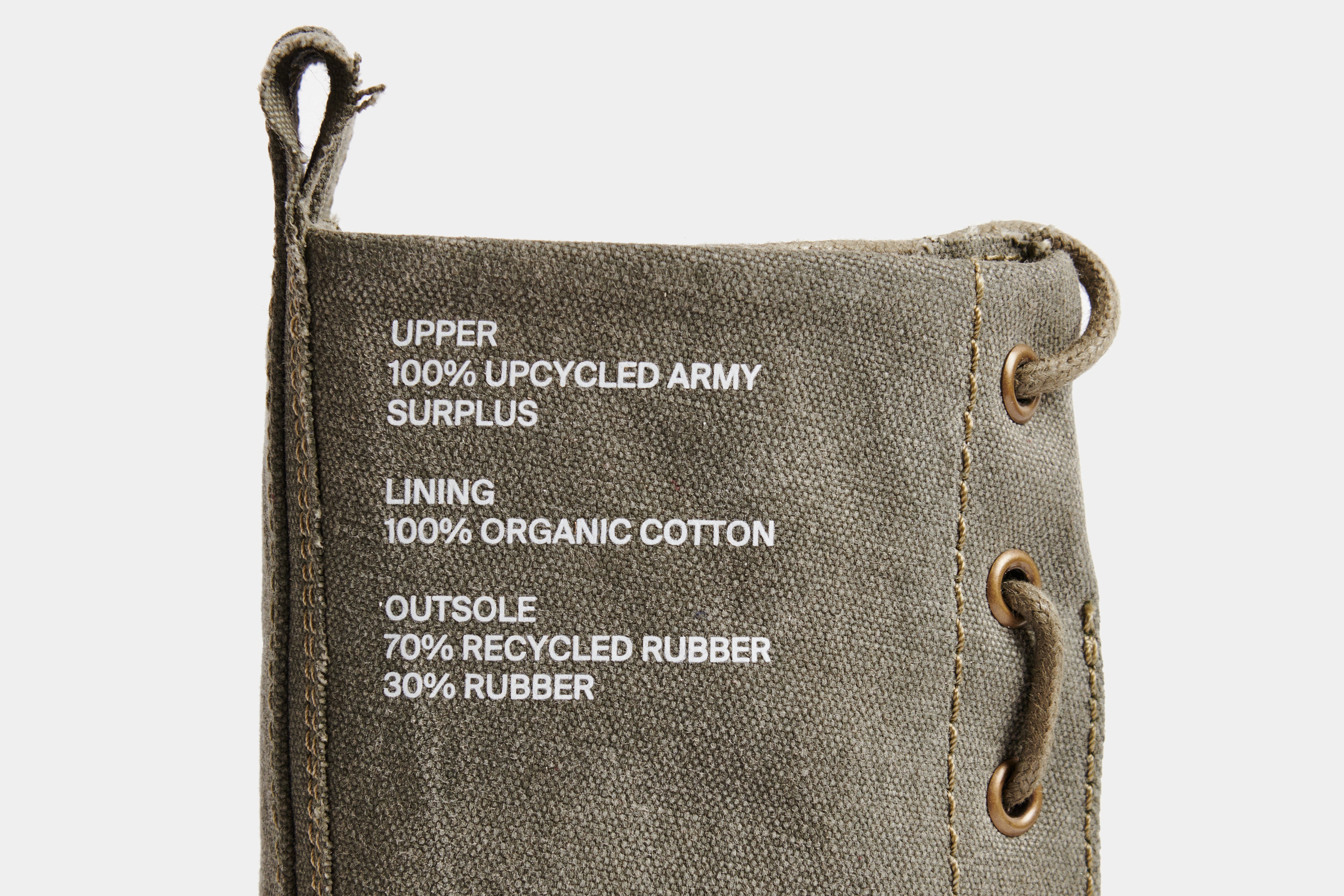 1992z vegan combat boot with a zipper out of upcycled surplus army tents in green shown close up