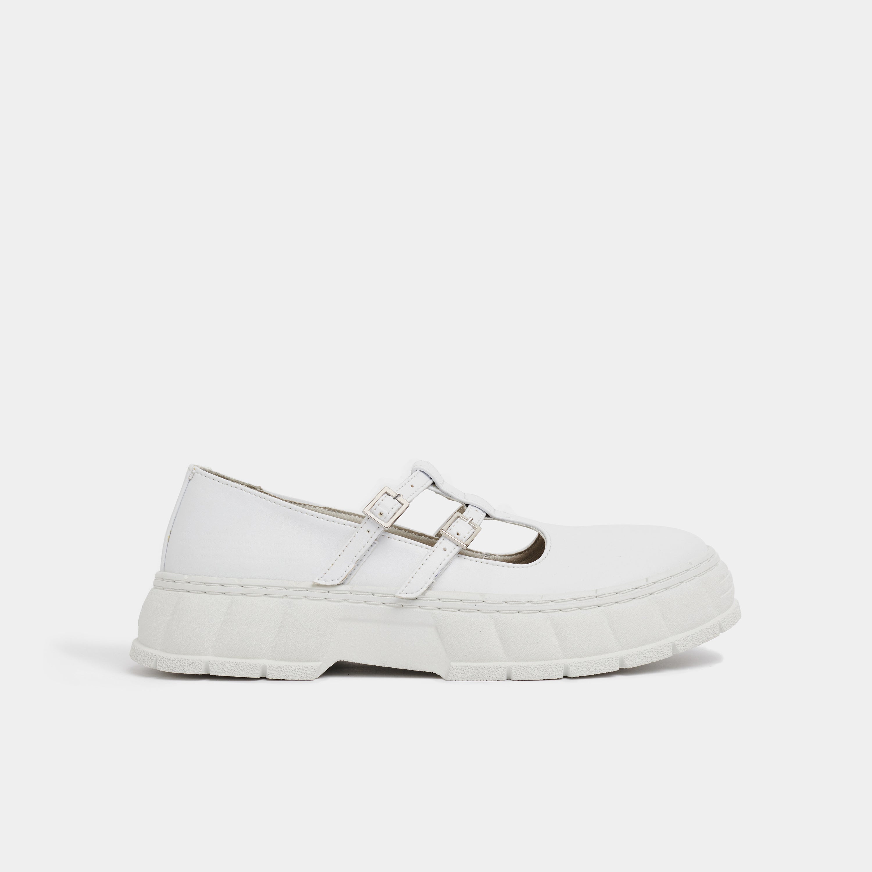 2001 Vegan simple Mary Jane shoes made from vegan leather in white apple shown from the side