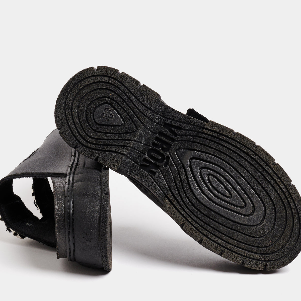 2018 Vegan black platform sandal made from corn leather shown from the bottom