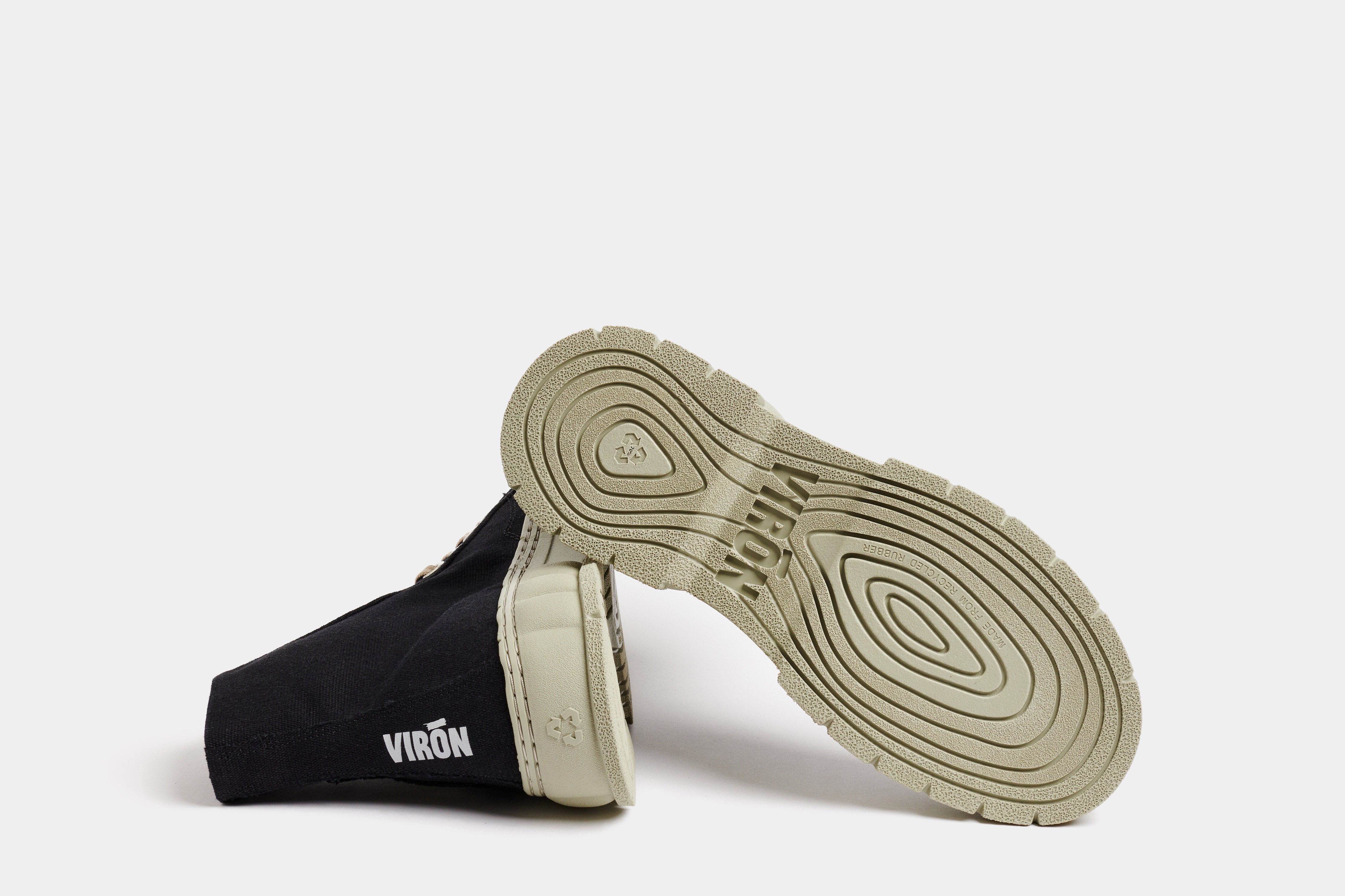 1982 Vegan high top sneaker made from recycled cotton in Black with green sole shown from the bottom