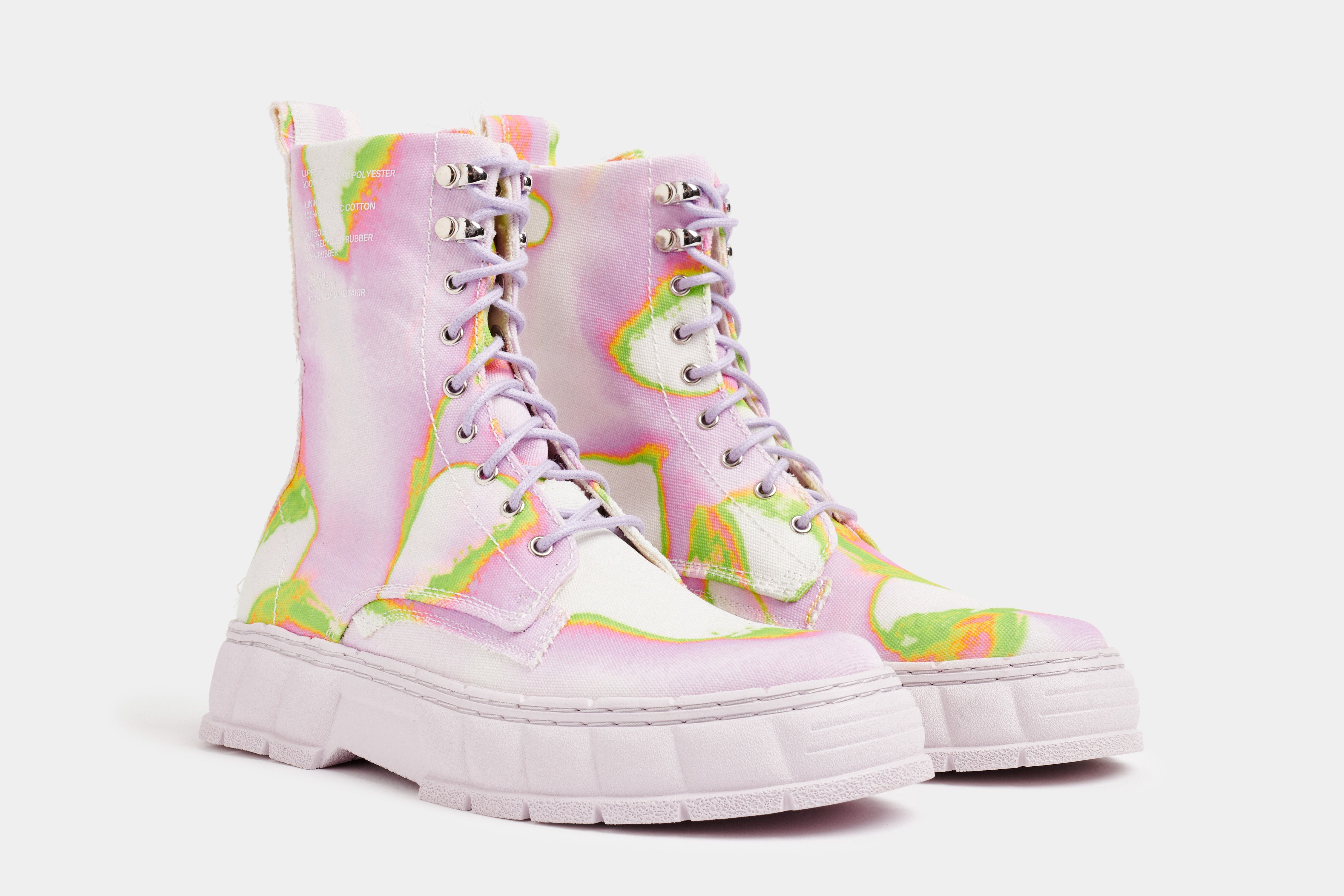1992 Vegan combat boot made from recycled PET in pink and green shown from the front