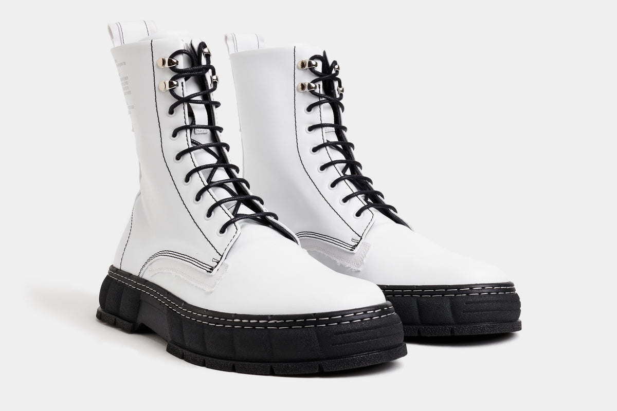 1992 Vegan combat boot out of Appleskin in white with black sole shown from the front