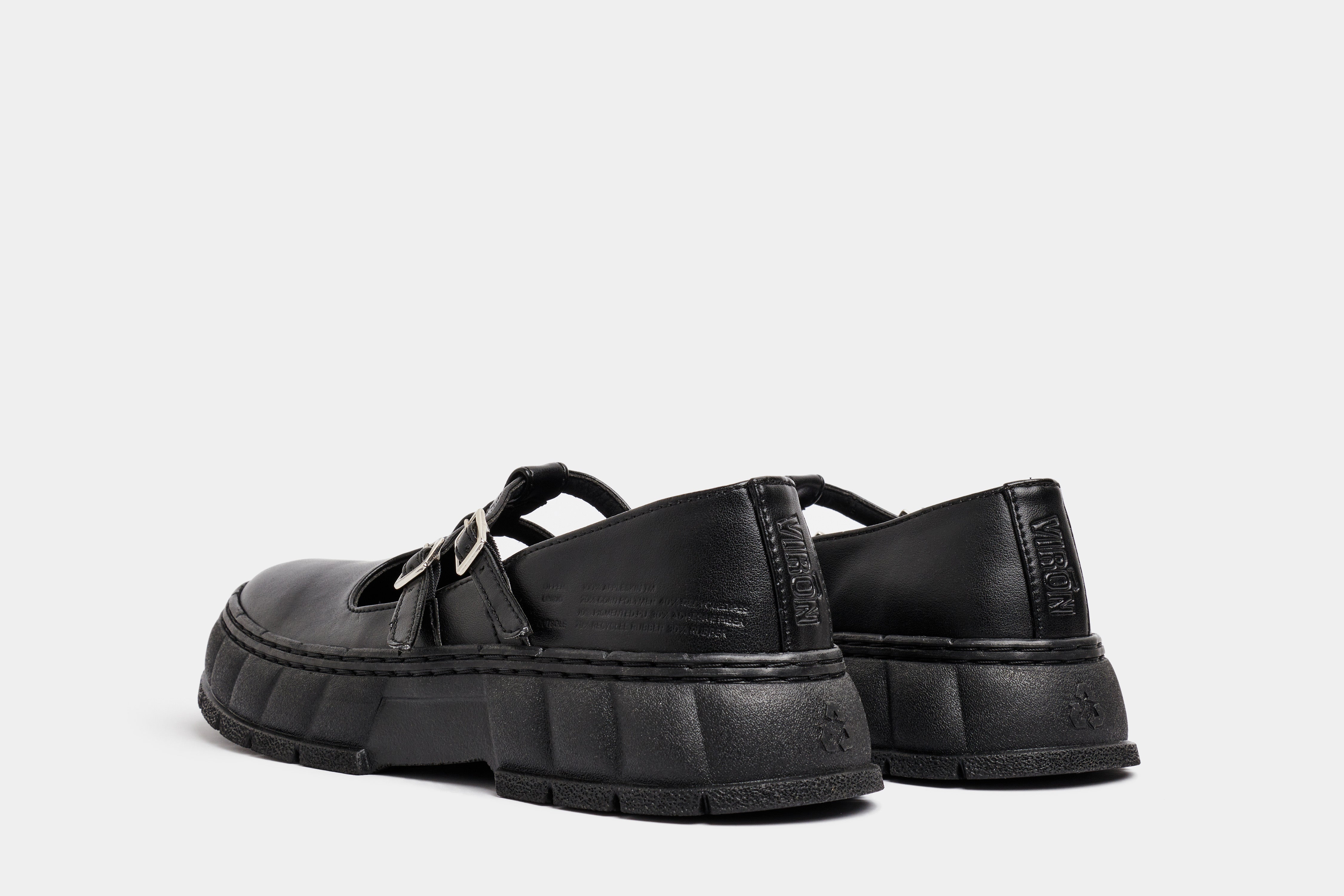 2001 Vegan simple Mary Jane shoes made from vegan leather in black apple shown on from back2001 Vegan simple Mary Jane shoes made from vegan leather in black apple shown from the back