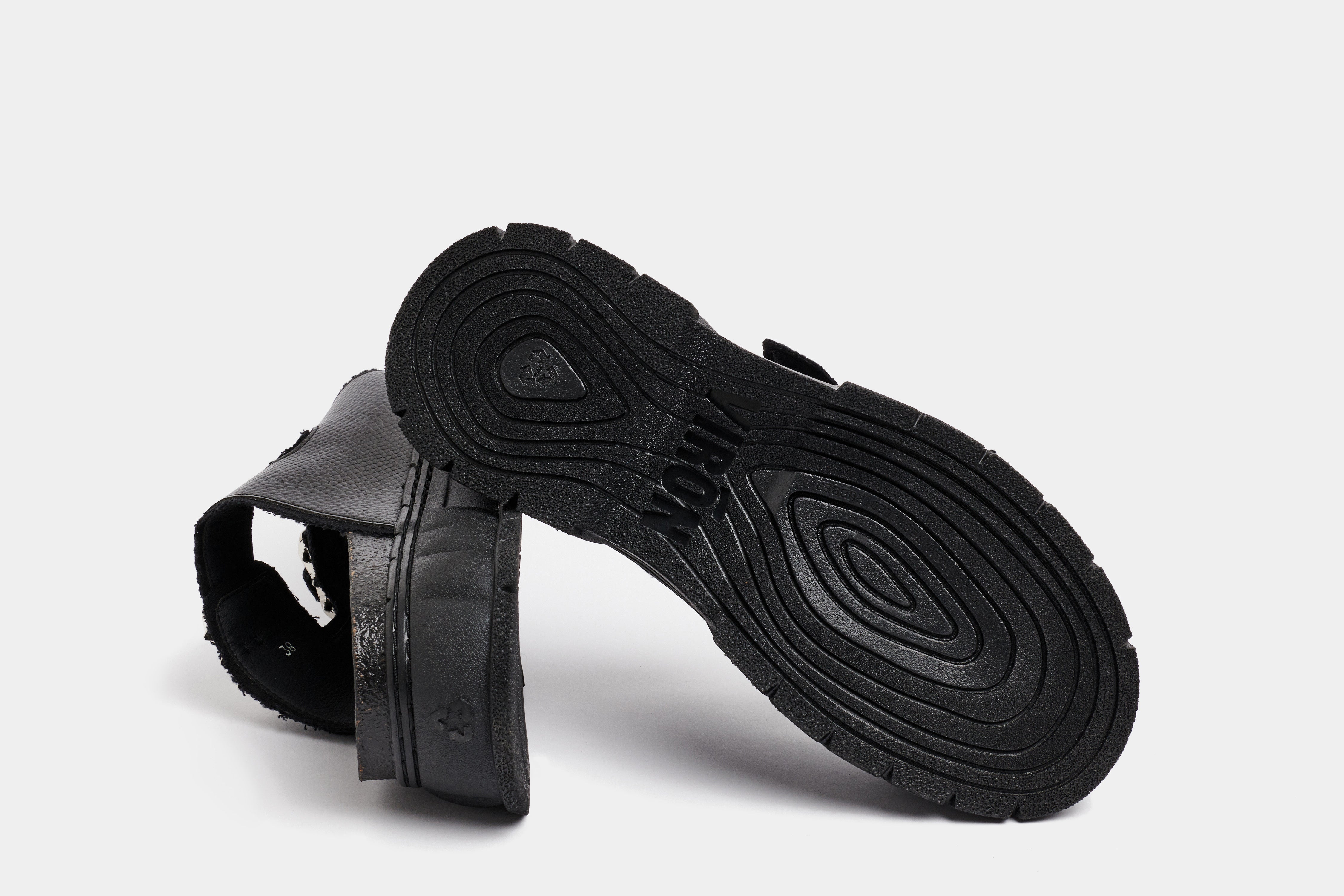 2018 Vegan black platform sandal made from apple leather in snake optic shown from the bottom