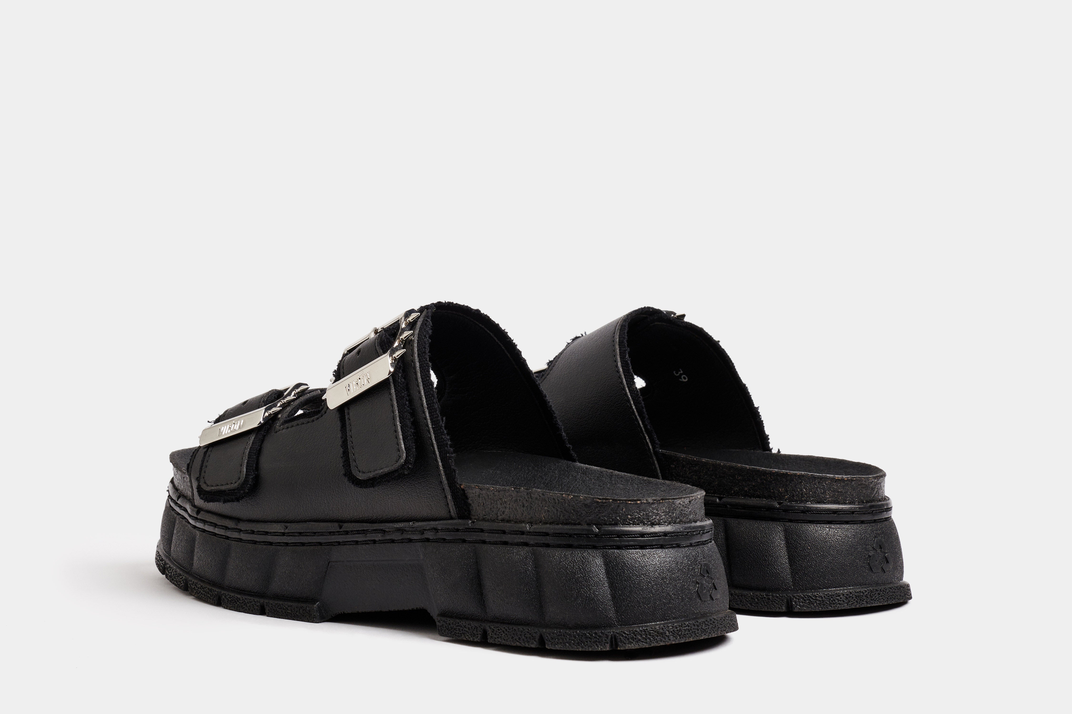 2018 Vegan black platform sandal made from corn leather shown from the back