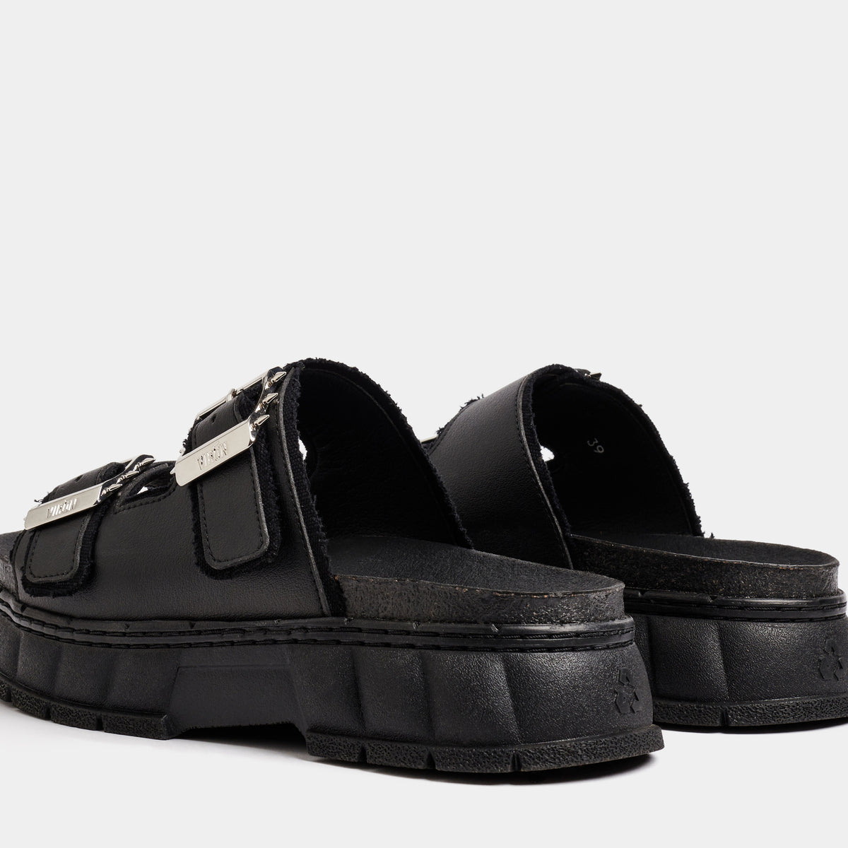 2018 Vegan black platform sandal made from corn leather shown from the back