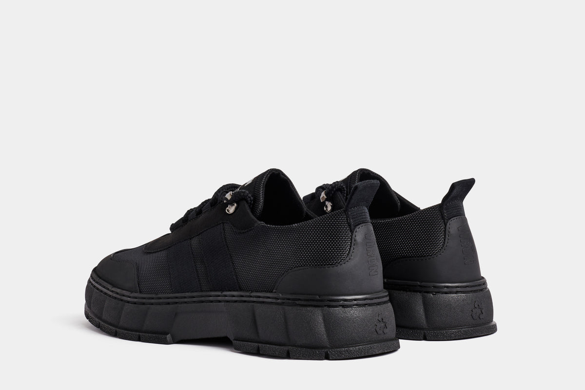 2008 Vegan army low-top sneaker out of recycled PET in black nylon shown from the back