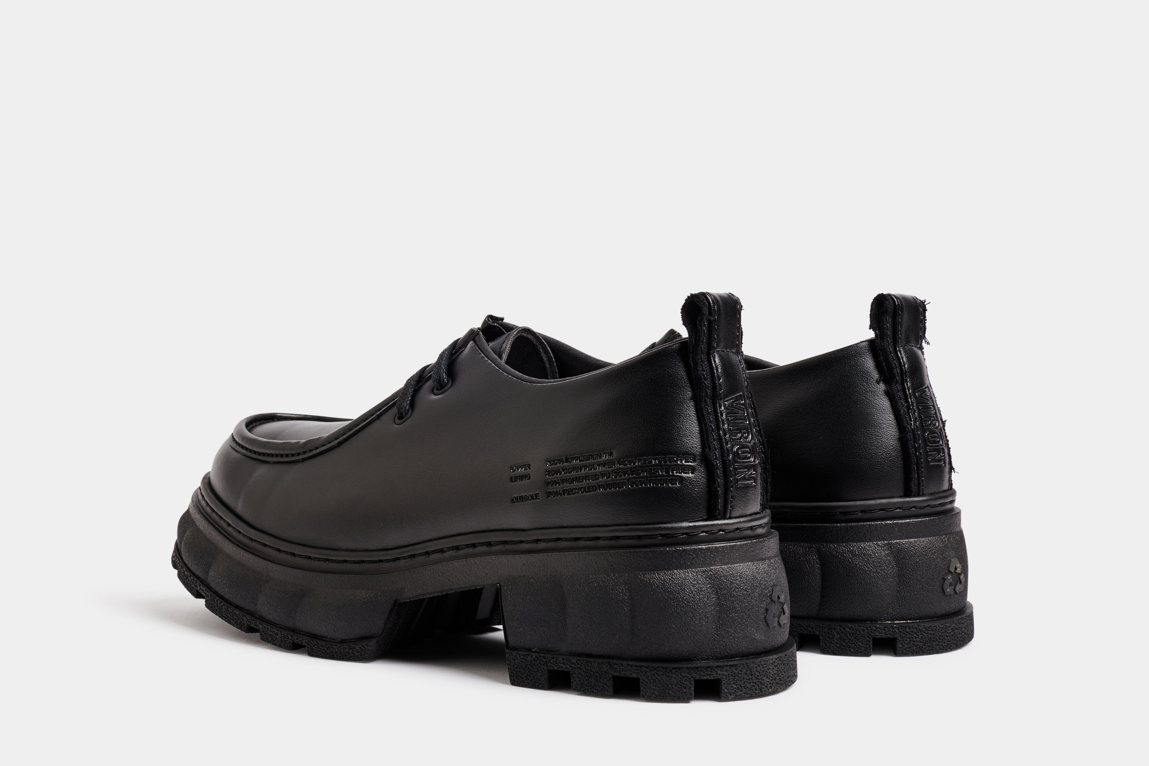 New Order Vegan take on paraboot workwear shoes out of Appleskin in Black Apple shown from the back